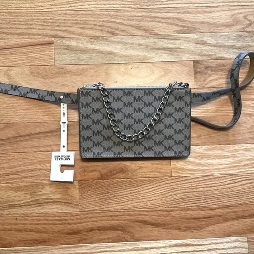 Micheal korse hand held/ and or cross body bag